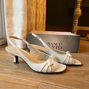 White Franco Sarto kitten heel sling-backs with bow detail